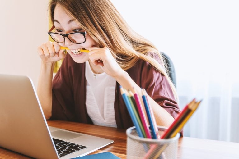 Woman stressing on front of the computer