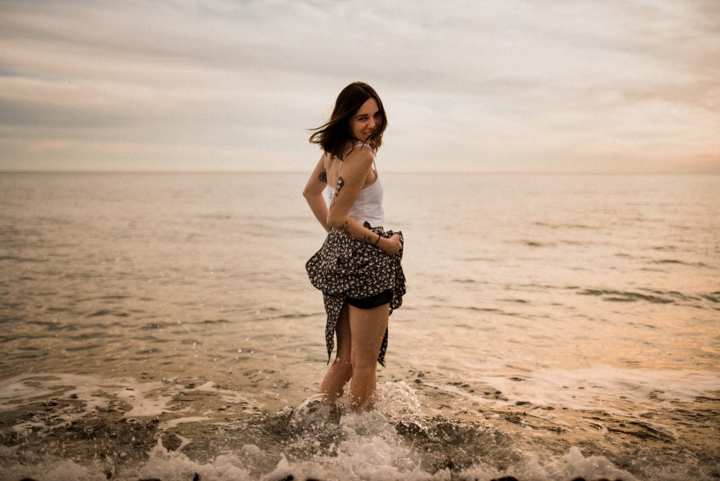 Woman paddling in water, grreat for restless legs