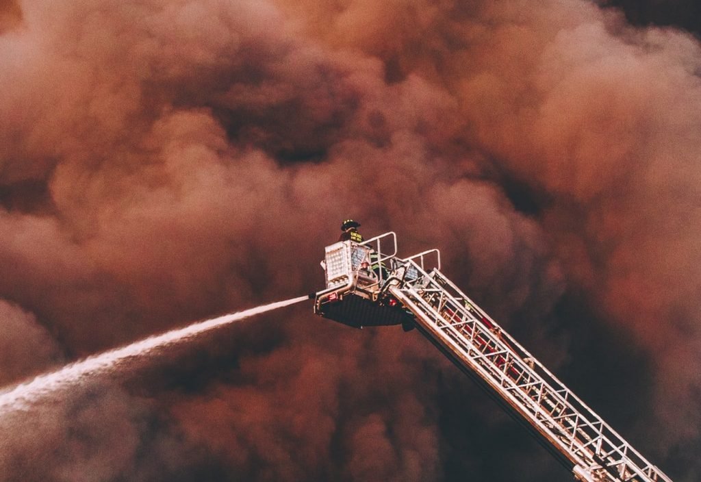 Firefighters putting down a fire: damp-heat can be a major problem for your gallbladder