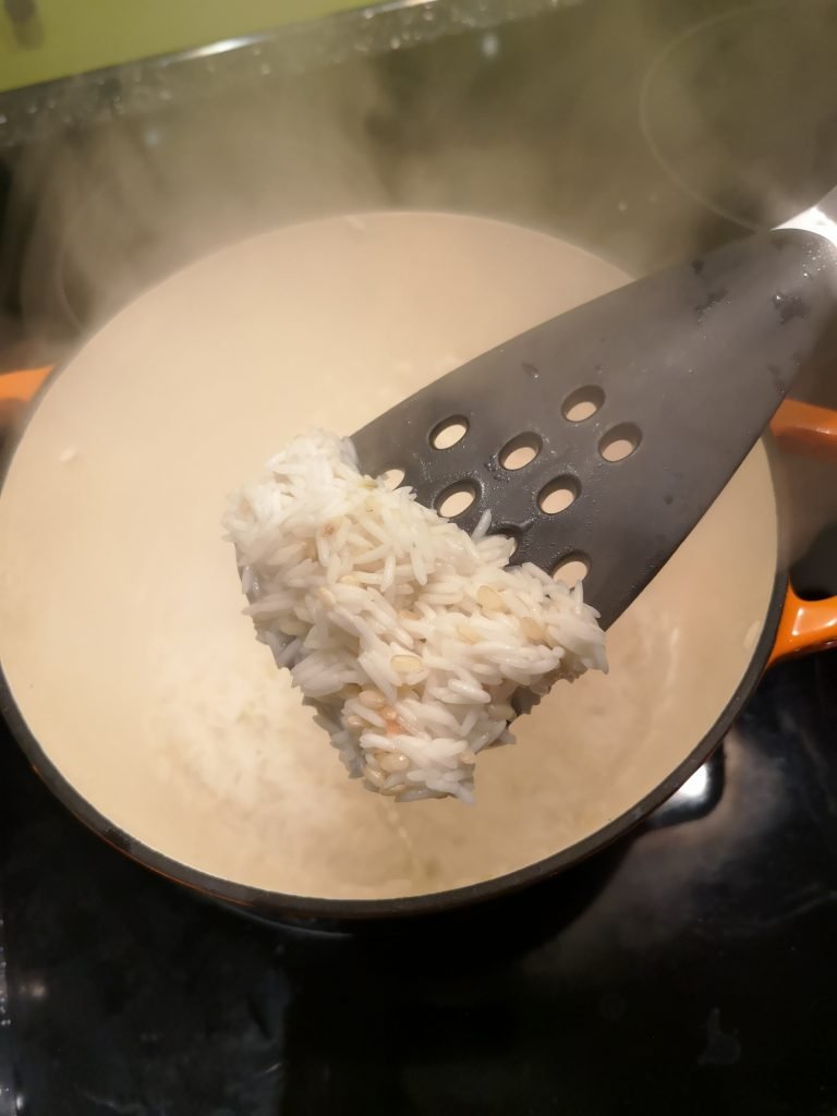 Rice drying after first addition of water and stirring for clogstoun congee