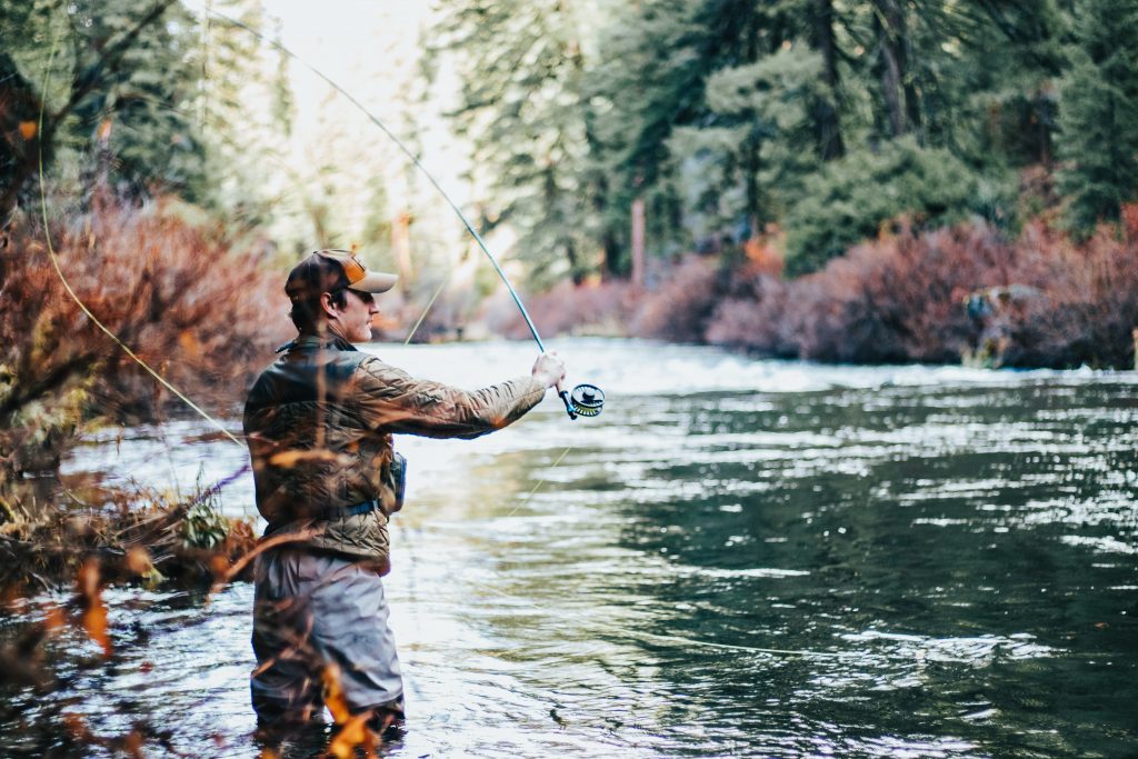 Man fishing - sometimes a cause of Dampness in the Body.