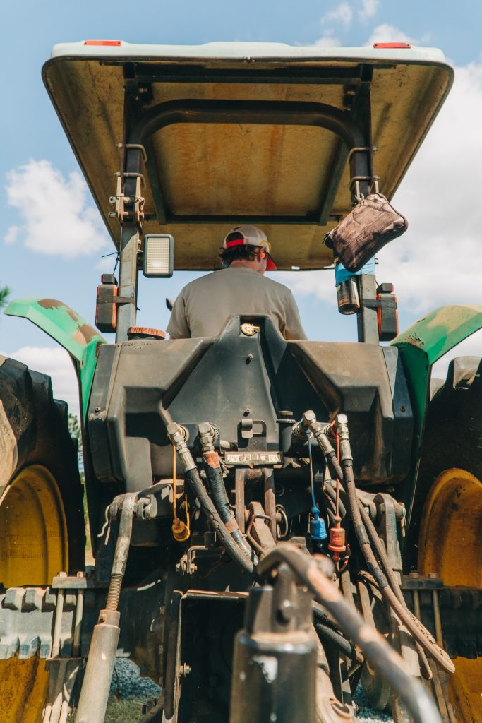 Crop spraying tractor: supplements for the soil
