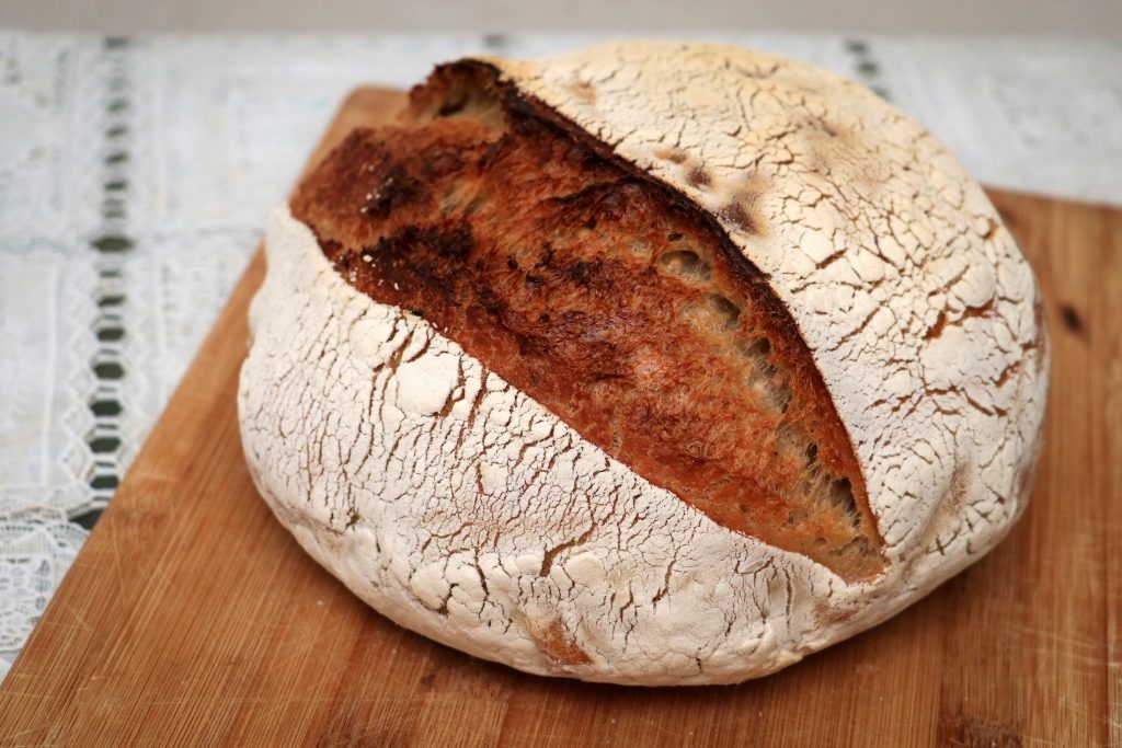 sourdough bread on brown wooden table