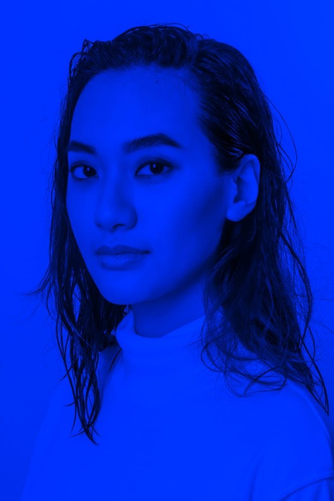 woman in blue crew neck shirt