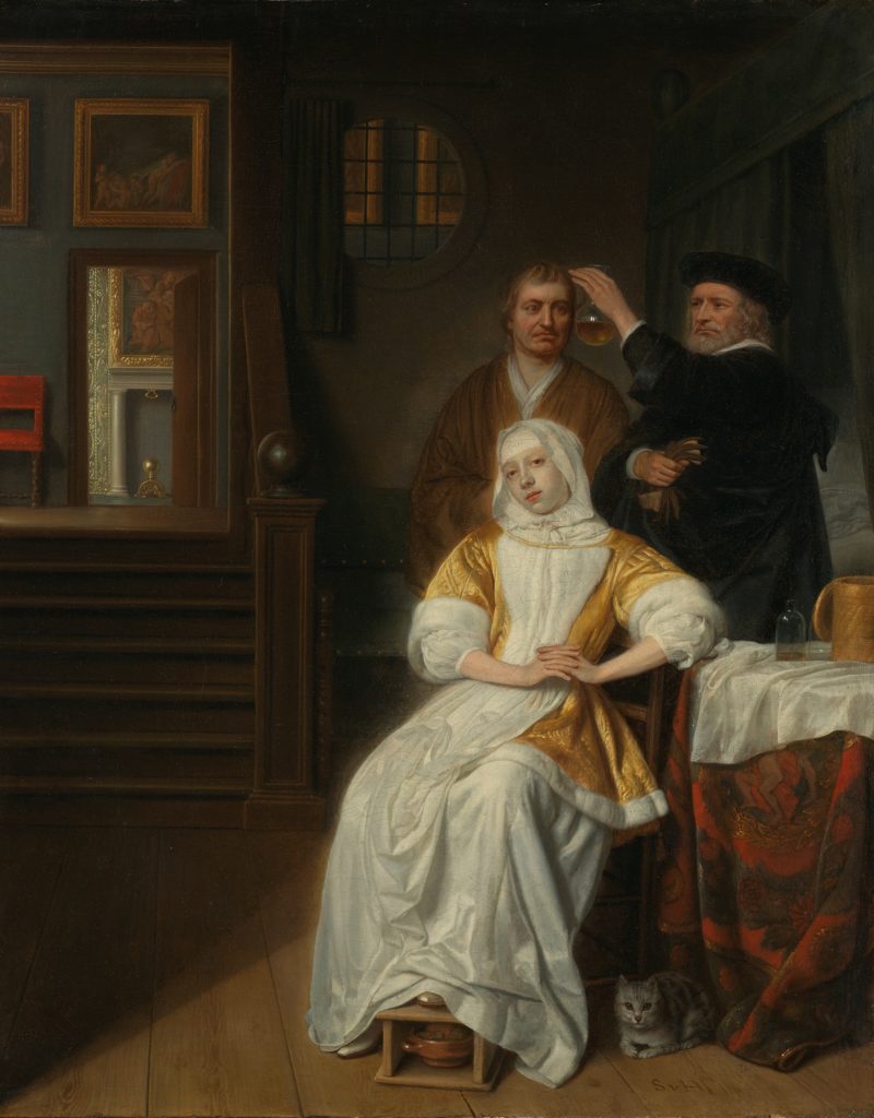 woman in white dress sitting beside man in black suit
