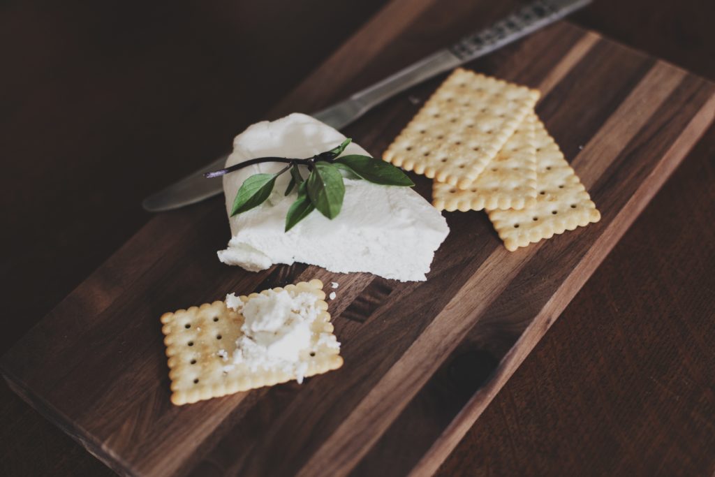 biscuits on chopping board: cheese can cause damp.