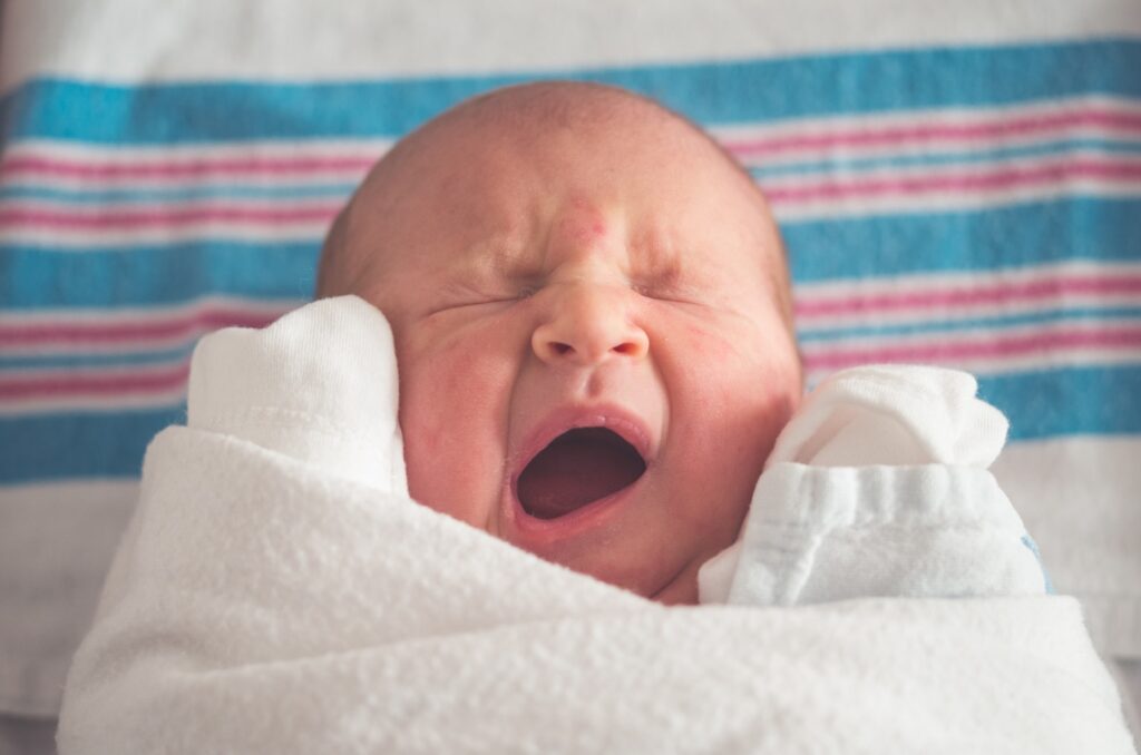 baby crying from food accumulation