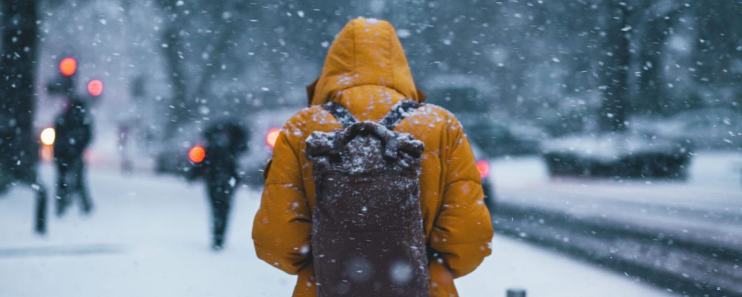 Man Walking in the Snow